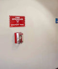 High Vis Wall Case For Fire Sprinkler Shut Off Tool mounted on wall, featuring clear polycarbonate design for accessibility.