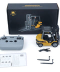 Mini Warehouse RC Forklift Model 9925 With Realistic Light And Sound Effects Precise Steering Lift Lower Function Plus Remote Control Operation For Indoor Play with controller and accessories.