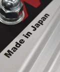 Close-up of "Made in Japan" label on Three Roller Indoor Bicycle Roller For Stable Ride On Road And Mountain Bikes Fits 24 To 700C