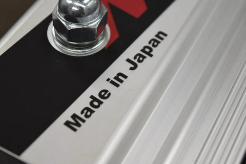 Close-up of "Made in Japan" label on Three Roller Indoor Bicycle Roller For Stable Ride On Road And Mountain Bikes Fits 24 To 700C