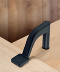 Heavy Duty Four Pack Bench Holdfast Clamps And Eight Pack Workbench Dogs For 3/4 Inch Holes in use on wood surface.