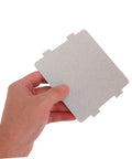 Hand holding a 10 Pack Microwave Waveguide Cover Mica Sheet, universal fit for heat insulation and repair, cuttable to size, durable replacement part.