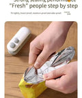 Hands using Portable Double Function Bag Sealer And Cutter With Usb Cable to seal a foil snack bag securely.