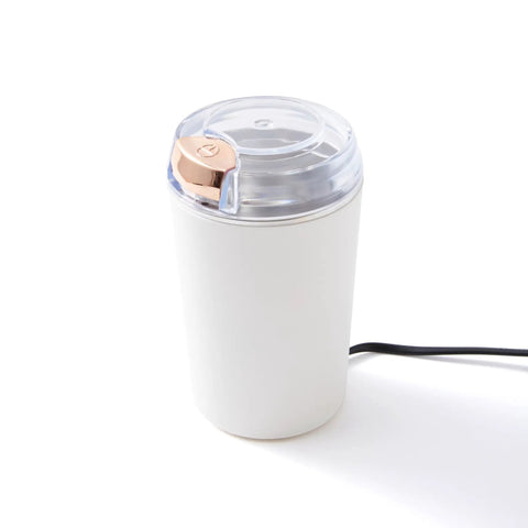 Compact Electric Flax Seed Grinder for Smooth Fresh Grinding Perfect Spice Mill For Daily Kitchen Use Plug In Design with sleek white exterior.