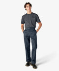 Original Straight Leg Work Pants Built Solid As A Rock With The Roomy Big And Tall Fit Stone Cold Durable Polyester Cotton Blend Resists Wrinkles And Grease Spills Perfect For The Job Site Or Daily Office Hustle Navy Shade worn by a model.