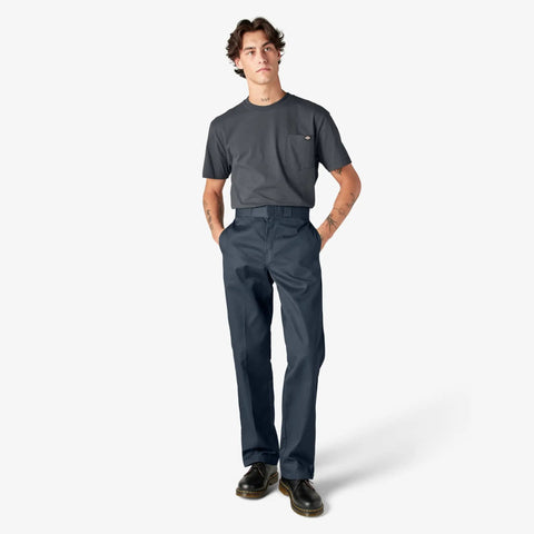 Original Straight Leg Work Pants Built Solid As A Rock With The Roomy Big And Tall Fit Stone Cold Durable Polyester Cotton Blend Resists Wrinkles And Grease Spills Perfect For The Job Site Or Daily Office Hustle Navy Shade worn by a model.