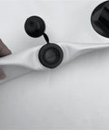 Close-up of valve and cap on inflatable outrigger stabilizer for kayaks and canoes, PVC buoyant boat stabilizer.