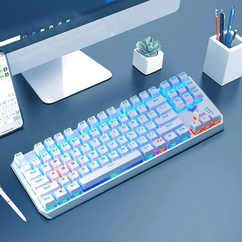 Kick Ass Mechanical Gaming Keyboard 87 Keys Tenkeyless Build Hella Smooth Typing with RGB lighting on a desk setup.