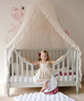 Tot Friendly Cozy Kids Bed Canopy With Lace Chiffon Netting And Pom Poms Dreamy Princess Fairy Tent above nursery crib