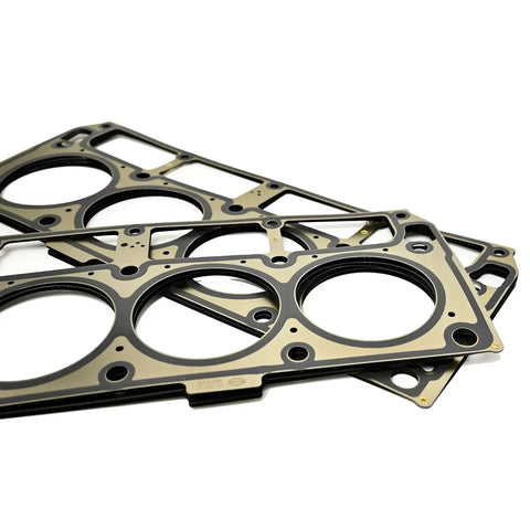Road Warrior Camshaft Kit Designed For Crushing Stock Horsepower On Chevy Ls Blocks While Delivering Thumping Lower End Torque Using Bold.573 Valve Specs - close-up of multi-layered gaskets.