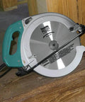 Beefy 15 Amp Electric Circular Saw With 2300 Rpm Motor And Quick Electric Brake resting on a wooden surface.