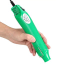 Person holding a portable green 110V 300W handheld heat gun with non-slip handle, 3.28ft cable, ideal for crafting and DIY projects.
