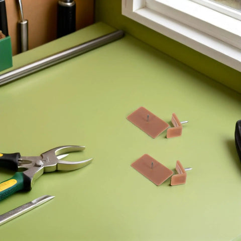 Heavy Duty Plastic Drawer Glides Repair Kit with Tack In Stops on workbench, includes rectangle and L-shaped stops