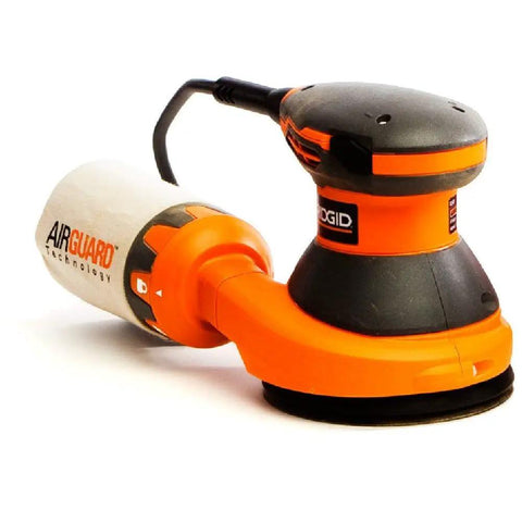 3 Amp 120V 5 Inch Random Orbit Sander With AirGuard Dust System Pro Grade Variable Speed Dial Permanent Magnet Motor For Steady Power Under Load Hex Grip Micro Texture For Comfort Durable Build Renewed ZRR2601, showing side view with AirGuard dust bag attachment.