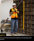 Worker using Magnetic 32 Inch Level Type 96M For Pros Heavy Duty Aluminum Body Rare Earth Magnets Grab Metal Surfaces Ultra Accurate Vials