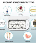 Diagram of All In One Ultrasonic Glasses And Jewelry Cleaner 640ML 48KHz Powerful Sonic Cleaning Machine cleaning various items.