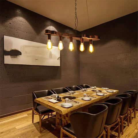 Dope Bronze Linear Island Light With Guitar Shade, Industrial Farmhouse Ceiling Fixture in a dining room over a wooden table