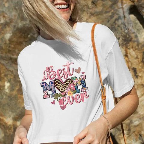 Woman wearing cropped T-shirt with 'Best Mom Ever' floral and leopard print design, part of Four Pack Iron On Transfers For T Shirts.