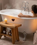 24 Inch Teak Shower Bench With Storage Shelf Waterproof Bathroom Seat For Adults And Seniors in spa setting next to bathtub