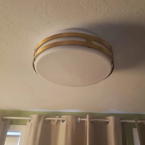 Dope 12 Inch 18W Dimmable Flush Mount LED Ceiling Light With Frosted Glass Shade In Brass Finish installed on ceiling