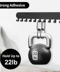 Two Pack Wall Key Holder With Ten Hooks Each No Drill Self Adhesive Key Rack For Living Room Kitchen Bathroom And Garage Black Finish Easy Mount Helps You Find Keys Fast And Keep Them Organized holding a 22lb kettlebell