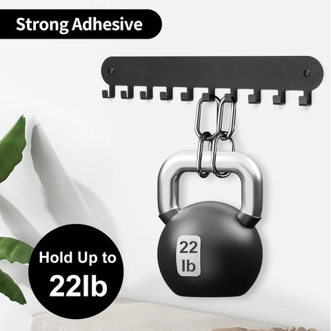 Two Pack Wall Key Holder With Ten Hooks Each No Drill Self Adhesive Key Rack For Living Room Kitchen Bathroom And Garage Black Finish Easy Mount Helps You Find Keys Fast And Keep Them Organized holding a 22lb kettlebell