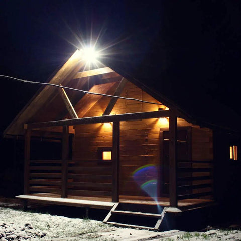 Led Barn Light Outdoor Flood Security Light 42W 5000K Dusk To Dawn LED Flood illuminating a wooden porch at night