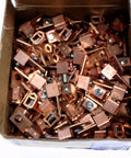 Rock Solid Copper Wire Connectors Pack of One Hundred with Quarter Inch Bolt and V Bottom Collar for Four to Fourteen AWG, copper clips in box.