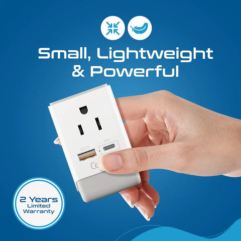 Hand holding Go To Travel Plug Adapter With USB C And USB Ports, Two USA Sockets, Fast Charging PD QC 3.0 Charger.