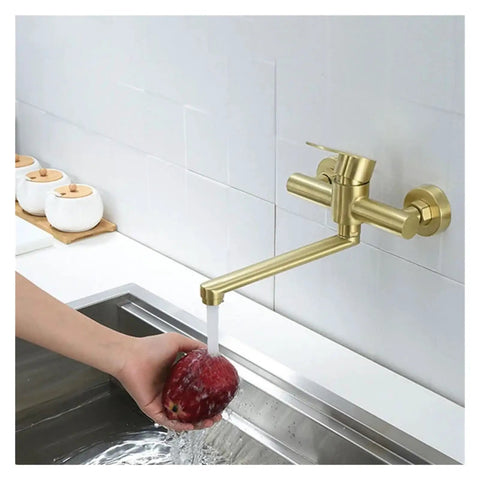 ntumLeap Brushed Nickel Wall Mounted Kitchen Faucet 180° Rotating Hot & Cold Water Mixer Dual Hole Basin Tap in use with an apple.