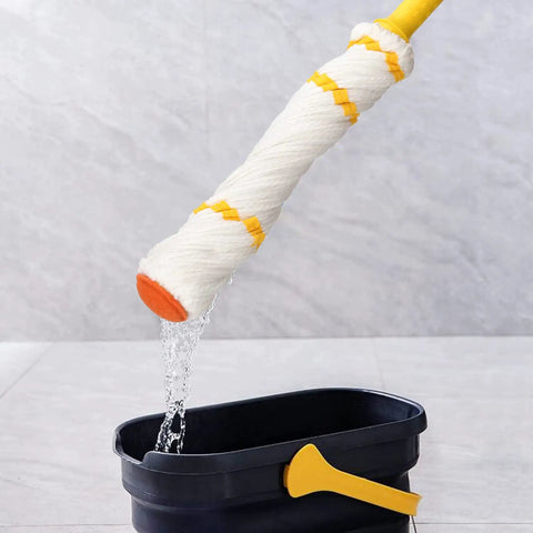 Self Wringing Twist Mop With Long 57 Inch Handle Microfiber Floor Mop With Top Scrub Pad demonstrating wringing above bucket