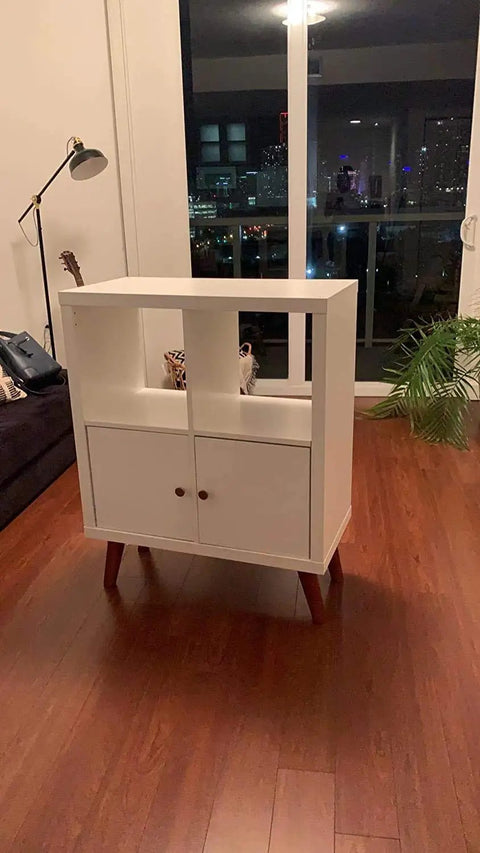 White cabinet with round solid wood furniture legs 6 inch replacement set of 4 for sofa couch bed coffee table modern mid century style walnut finish ideal for easy IKEA hack and home makeover.