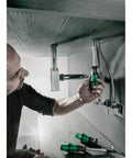 Person using Hollow Nutdriver Set 7 Piece Imperial SAE With Alloy Steel Shanks And Multi Component Handles under sink for repairs