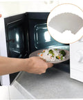 Inserting a plate into a microwave with Six Piece Microwave Oven Mica Sheet Insulation And Waveguide Cover in view inset
