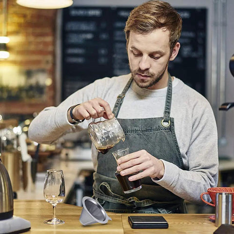 Barista using Upgraded Stainless Steel Pour Over Coffee Filter Dripper For One To Two Cups With 800 Mesh Slow Filter in coffee shop.