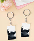 Aircraft Carrier Acrylic Keychain Transparent and Durable Key Ring Charm for Vinyl Kits and Pendants Oxidation Resistant Clear Navy Ship Charm for Photos Lanyards Bags and Everyday Gear shown with floral backdrop.