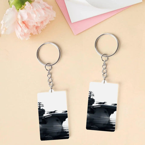 Aircraft Carrier Acrylic Keychain Transparent and Durable Key Ring Charm for Vinyl Kits and Pendants Oxidation Resistant Clear Navy Ship Charm for Photos Lanyards Bags and Everyday Gear shown with floral backdrop.