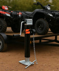 Heavy Duty Weld On Side Wind Trailer Jack With 5000 Lb Capacity And Adjustable Drop Leg For RV Camper Utility Trailer Stabilization, close-up view with trailer.