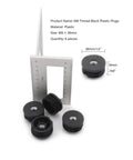 Six Pack 1.5 Inch Threaded Tube Plugs For Furniture Legs With M8 Screw Holes Black Plastic Round Nut Plugs next to measuring tool