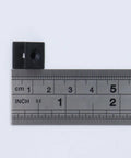 One Hundred Plastic Drawer Wedges With M4 Self Tapping Screws For No Sweat Furniture Repair And Tight Cabinet Slider Fixes Rock Solid Fixing Blocks Quick Household Upkeep Projects, measuring ruler beside a black plastic drawer wedge.