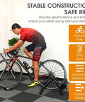 Cyclist using Indoor Bike Trainer With Magnetic Resistance Foldable Portable Turbo Trainer Stand for mountain and road bikes.