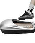 Automatic Shoe Cover Dispenser With Walk Through Overshoe Film Skip The Squat Hands Free Stainless Steel Blade Walk Thru Guard Fits US Size 11 in use with a sneaker.