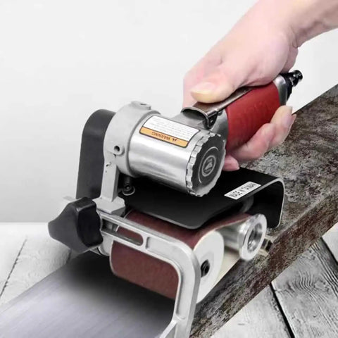 Heavy Duty Pneumatic Belt Sander Handheld Grinder Machine 7000 Rpm used on wood surface for polishing and smoothing.