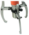 Close-up of Grease Monkey Essential Five Ton Hydraulic Bearing Puller with three jaw claws used for seizing bushings.