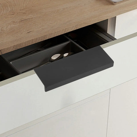 Slick Matte Black Recessed Cabinet Handles Edge Pulls on a kitchen drawer, hidden flush finger pulls for sliding doors and drawers