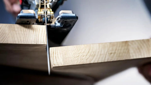 Close-up of Pro Gear Tear Free Jigsaw Blades T Shank T 308 Bo cutting plywood edges with smooth precision.