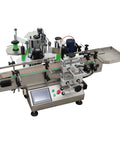 Automatic Desktop Round Bottle Labeling Machine With Conveyor Applicator For Cosmetics Beverages And Food Runs Twenty To Thirty Bottles Per Minute At One Hundred Ten Volts Hassle Free Plug And Play Setup, silver and black machine with control panel.