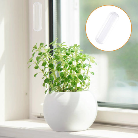Clear PU self adhesive recessed finger pulls on window frame, shown with plant in white pot for sliding glass doors, cabinets, drawers