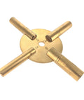 Close-up of a Universal 4 Prong Brass Clock Winding Key Set for winding vintage and modern clocks with odd and even number dials