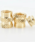 Solid Brass Knurled Insert Nuts Hot Melt Threaded Hardware For 3D Printer And Laptop Repairs M2 To M6 Sizes showing four brass inserts with knurled grip.